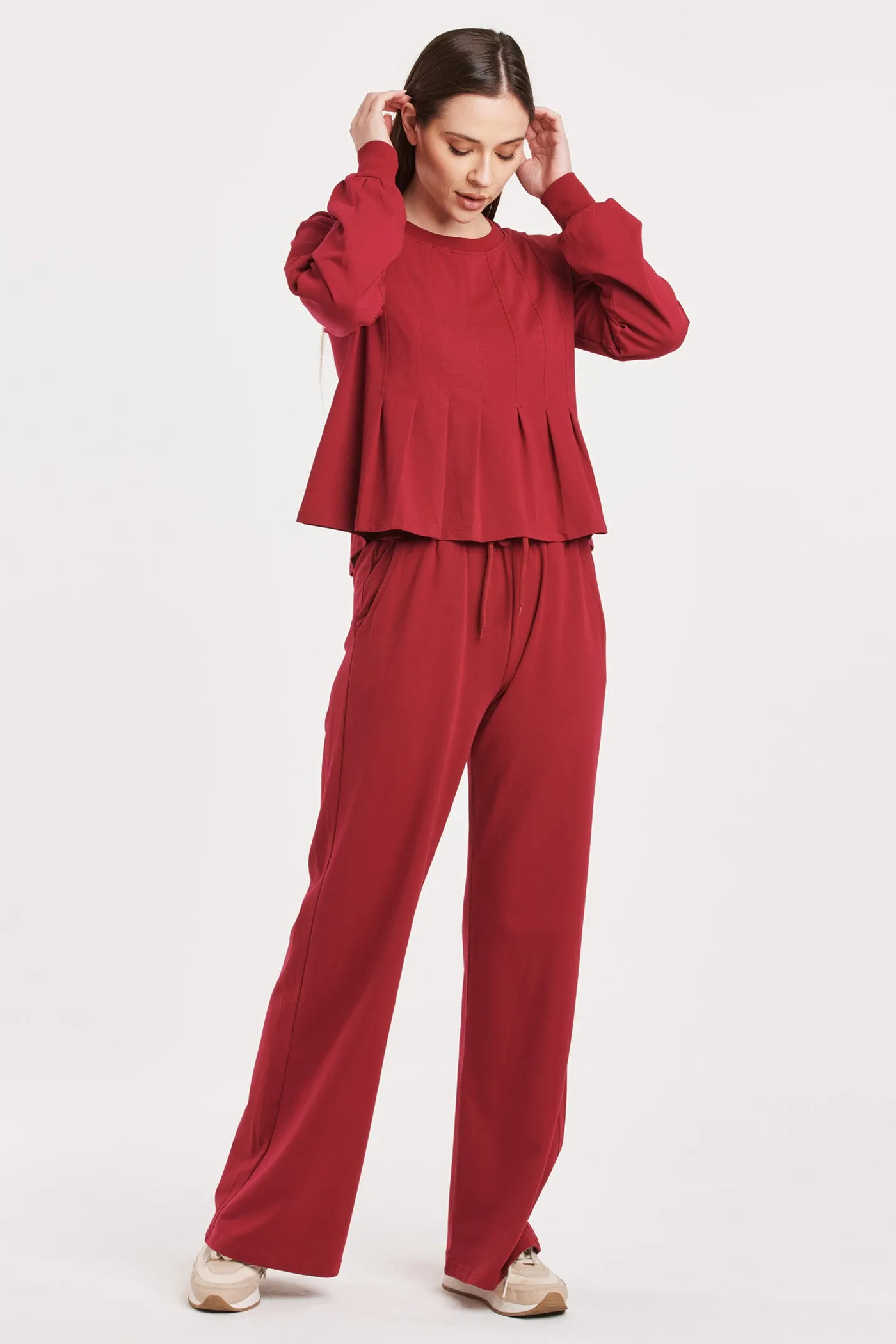 DOVE LONG SLEEVE PLEATED PEPLUM TOP GRANADA