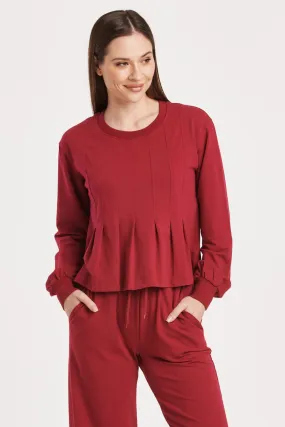 DOVE LONG SLEEVE PLEATED PEPLUM TOP GRANADA
